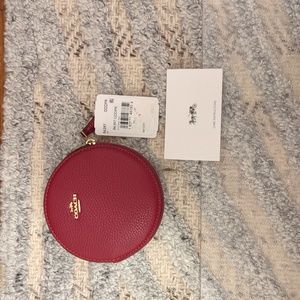 Red leather Coach round zip coin purse